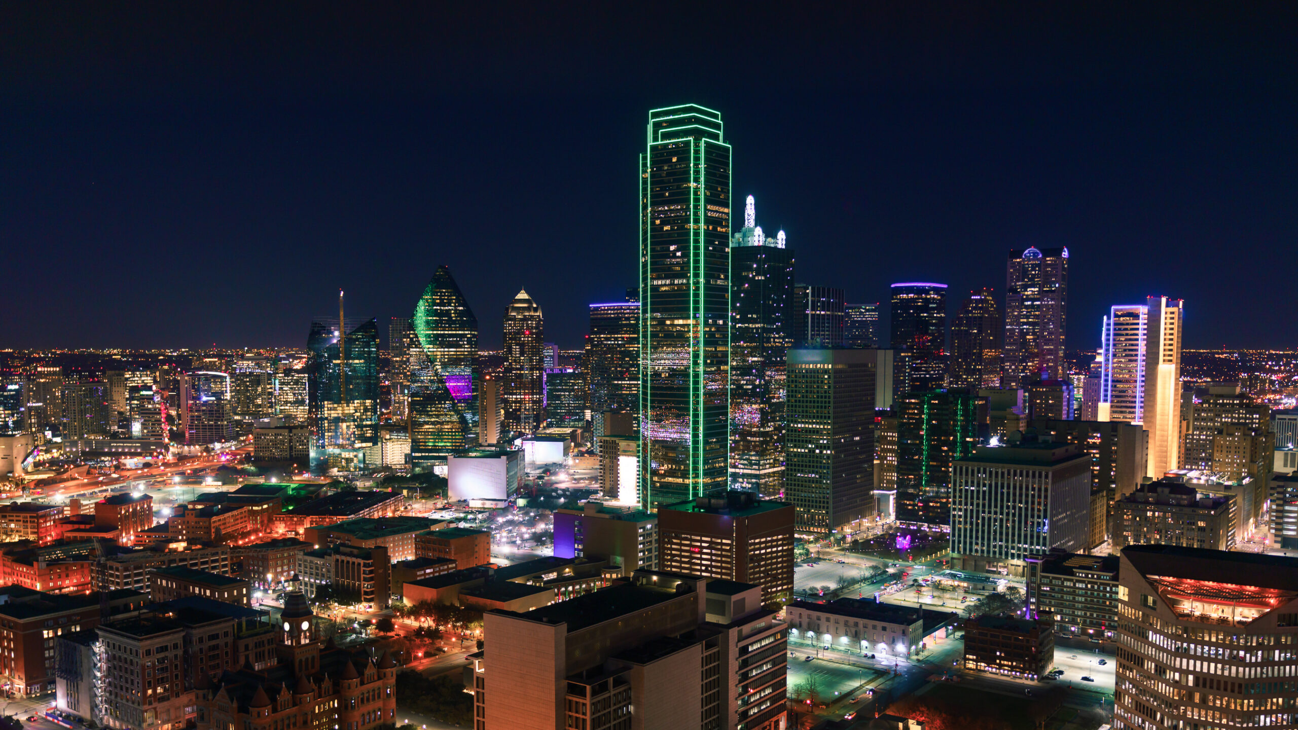 Dallas, Texas Cityscape with Skyscrapers Illuminated at Night | CDL DUI Attorney Dallas